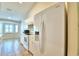 Kitchen with white cabinetry, updated appliances, and bright natural light at 3430 Hilson Dr, Lakeland, FL 33812