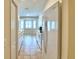 Bright kitchen featuring ample white cabinetry, bay windows, and modern appliances at 3430 Hilson Dr, Lakeland, FL 33812