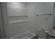 Bathroom features modern bath and shower at 3434 Avenue E Nw, Winter Haven, FL 33880