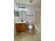 Bathroom featuring vanity, toilet, and bathtub with tile flooring and modern lighting at 351 Columbo St, Winter Haven, FL 33880