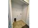Small laundry room with a tile floor and connections for a washer and dryer at 351 Columbo St, Winter Haven, FL 33880