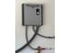 The 'Rheem' performance water heater is mounted on a white brick wall at 351 Columbo St, Winter Haven, FL 33880