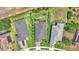 A bird's eye view of the property revealing the layout of three houses and driveways at 364 Lake Vista Dr, Auburndale, FL 33823