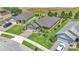 Aerial view showcases beautiful landscaping and well-manicured lawns in a residential neighborhood at 364 Lake Vista Dr, Auburndale, FL 33823