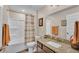 Bathroom featuring a shower-tub combo, granite countertop, and neutral decor at 364 Lake Vista Dr, Auburndale, FL 33823