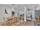 Dining room open to living spaces, featuring modern table and chairs at 364 Lake Vista Dr, Auburndale, FL 33823