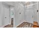 Foyer with tiled floors, a chandelier, and access to other rooms at 364 Lake Vista Dr, Auburndale, FL 33823