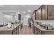 Spacious kitchen featuring a breakfast bar, modern appliances, and ample counter space at 364 Lake Vista Dr, Auburndale, FL 33823
