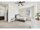 Bright bedroom with walk-in closet, plenty of light and neutral decor at 3833 Bowfin Trl, Kissimmee, FL 34746