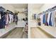 Organized walk-in closet featuring ample hanging space and shelving for efficient storage solutions at 3833 Bowfin Trl, Kissimmee, FL 34746