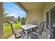 Covered back patio with outdoor seating and view of the backyard with a playground at 3853 Cortland Dr, Davenport, FL 33837