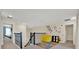 Inviting upstairs loft area with decor and carpet flooring at 3853 Cortland Dr, Davenport, FL 33837