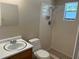 Bathroom featuring a tiled shower and vanity at 3949 Millstone St, Lake Wales, FL 33898
