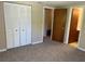 Bedroom with carpet flooring and closet at 3949 Millstone St, Lake Wales, FL 33898