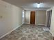 A versatile bonus room with tile flooring, perfect for an office or den at 3949 Millstone St, Lake Wales, FL 33898