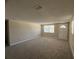 Bright and airy living room with a new carpet, and fresh paint at 3949 Millstone St, Lake Wales, FL 33898