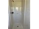 Enclosed shower space with a shower head and temperature controls at 3949 Millstone St, Lake Wales, FL 33898