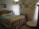 Comfortable bedroom with neutral decor and lots of natural light at 4007 Cypress Lndg S, Winter Haven, FL 33884