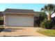 Charming single-Gathering home with brick driveway and lush landscaping at 4007 Cypress Lndg S, Winter Haven, FL 33884