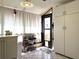Bright mud room with storage cabinets, tile floors, and an exterior door with a pet door at 4007 Cypress Lndg S, Winter Haven, FL 33884