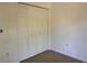Bedroom featuring a bi-fold closet at 403 Se 3Rd St, Fort Meade, FL 33841
