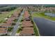 Aerial view of a neighborhood featuring ponds and a golf course at 4081 Dunmore Dr, Lake Wales, FL 33859