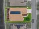 Overhead view of home with solar panels, brick driveway, and meticulously maintained landscaping at 4081 Dunmore Dr, Lake Wales, FL 33859