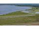 Scenic aerial view showing the lake and golf course at 4081 Dunmore Dr, Lake Wales, FL 33859