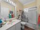 Bright bathroom featuring a shower-tub combination and a vanity with good lighting at 4081 Dunmore Dr, Lake Wales, FL 33859