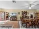 Open-concept dining room adjacent to the kitchen features elegant furniture and decor at 4081 Dunmore Dr, Lake Wales, FL 33859