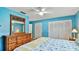 This spacious bedroom offers ample closet space and a relaxing atmosphere at 419 Broward Ter, Winter Haven, FL 33884