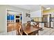 Kitchen, dining area and living room showing an open floorplan layout at 419 Broward Ter, Winter Haven, FL 33884