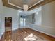 Open dining area with hardwood floors, chandelier, seamlessly connects to the living area, great for Gathering gathering and entertaining at 428 Terranova St, Winter Haven, FL 33884