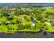 Aerial view showcasing the property boundaries, home, and its waterfront access at 4365 Canal Rd, Lake Wales, FL 33898