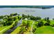 Aerial view showcasing the property's boundaries, home, and its proximity to Lake Pierce at 4365 Canal Rd, Lake Wales, FL 33898