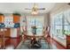 Another view of dining room featuring a wood table and chairs, with natural light from the adjacent window at 4365 Canal Rd, Lake Wales, FL 33898