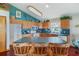 Well-equipped kitchen with ample counter space, modern appliances, and a breakfast bar at 4365 Canal Rd, Lake Wales, FL 33898