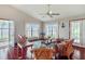 Cozy living room with water views, wicker furniture, and ample natural light at 4365 Canal Rd, Lake Wales, FL 33898