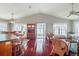 Bright and airy living room open to dining, with views of the lake at 4365 Canal Rd, Lake Wales, FL 33898