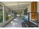 Inviting screened porch with seating area, perfect for enjoying outdoor views with protection at 4365 Canal Rd, Lake Wales, FL 33898