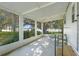 Spacious screened porch with scenic views, ideal for relaxing and enjoying the outdoors at 4365 Canal Rd, Lake Wales, FL 33898