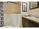 Bathroom features a spa-like bathtub and sink vanity at 4940 Foxdale Dr, Lakeland, FL 33810