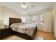 Comfortable bedroom with a queen bed, wood floors and lots of natural light at 4940 Foxdale Dr, Lakeland, FL 33810