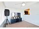 Cozy living room with comfortable carpet and modern television at 4940 Foxdale Dr, Lakeland, FL 33810