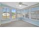 Bright sun room with large windows offering lots of natural light at 4940 Foxdale Dr, Lakeland, FL 33810