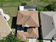 Aerial view of the house showing the roof and patio area, the backyard, and the home's position in the neighborhood at 4962 Sweet Cedar Cir, Orlando, FL 32829