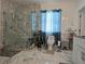 Accessible bathroom features a marble tiled shower, grab bars, and plant accents at 4962 Sweet Cedar Cir, Orlando, FL 32829