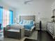 Comfortable main bedroom features a tufted headboard, ceiling fan, and coordinated decor at 4962 Sweet Cedar Cir, Orlando, FL 32829