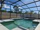 Sparkling in-ground pool within a screened enclosure and attractive tile work around the perimeter at 4962 Sweet Cedar Cir, Orlando, FL 32829