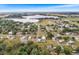 Aerial view showcasing the property in its neighborhood setting, with surrounding homes and landscape at 501 Main St, Lake Hamilton, FL 33851